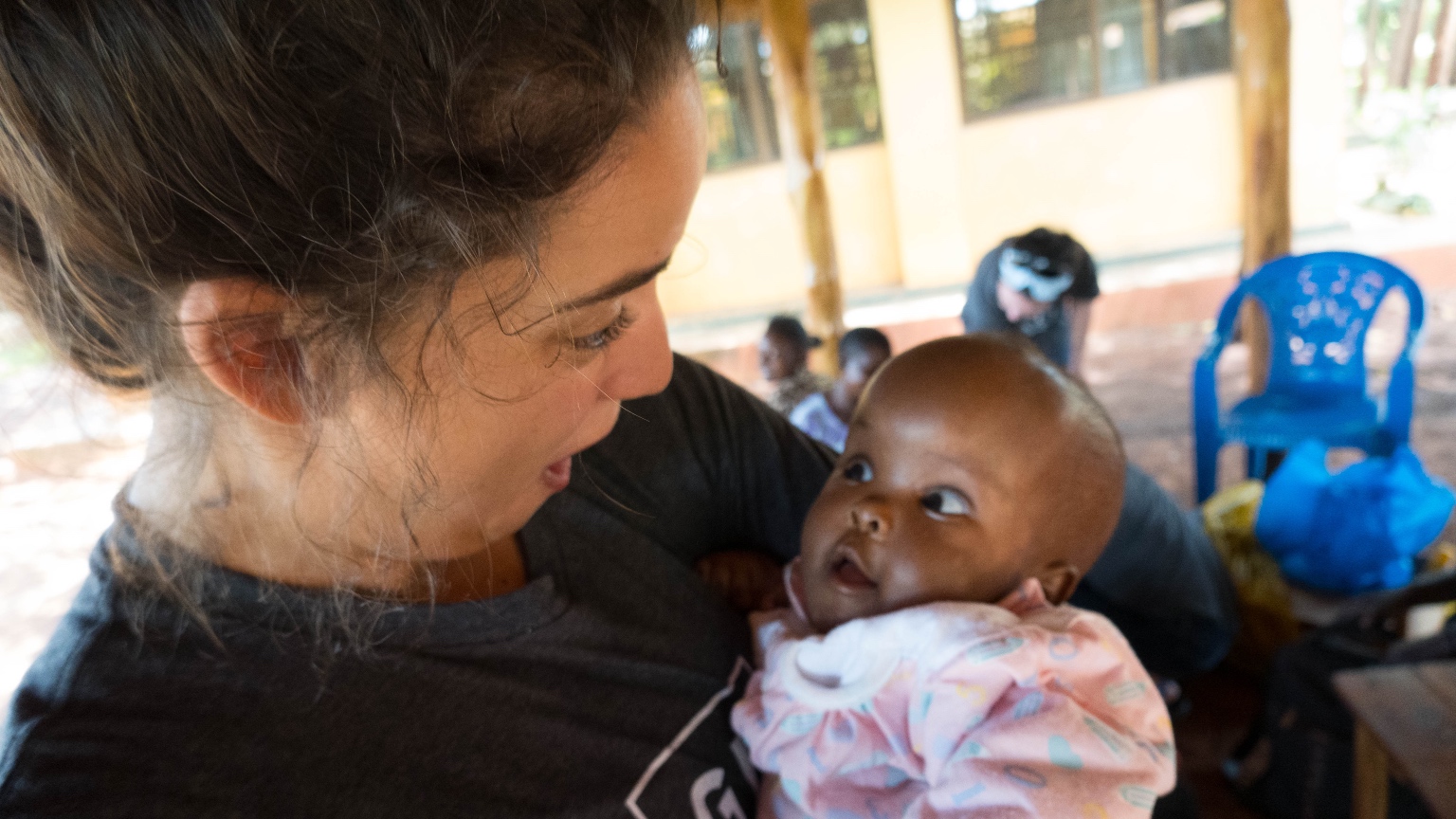 Uganda 102519 Maria Feldotto holding baby.jpg